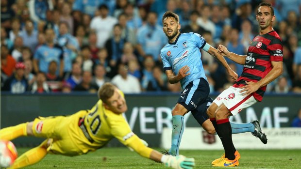 Second rate: Sydney FC midfielder Milos Ninkovic shoots during the derby against the Wanderers last month.