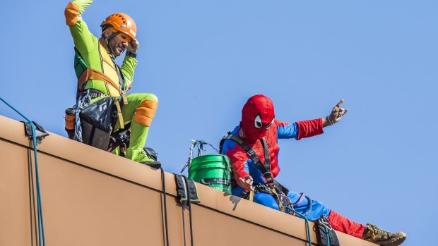 Rope Access Engineering employees Clifford Bourke and Time Greschke dress up to entertain the children at Canberra Hospital.