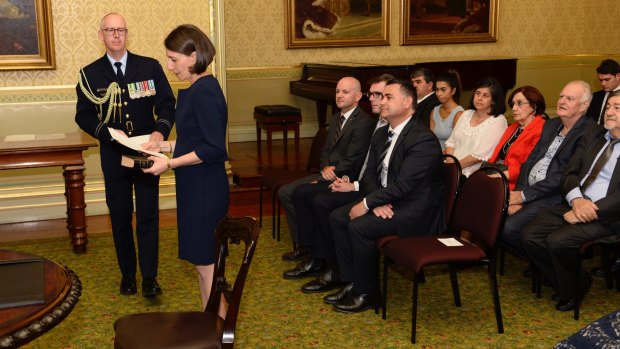 Ms Berejiklian is sworn as NSW Premier at Government House.
