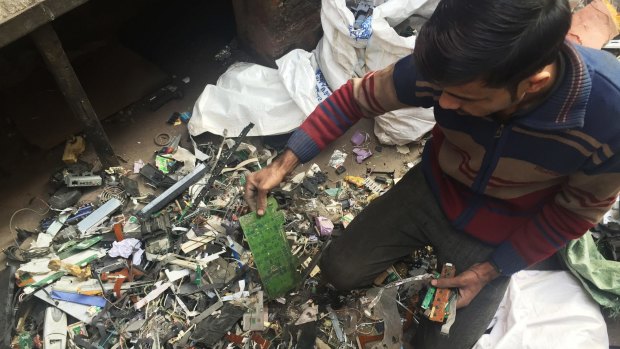 Imran Mansoori is one of an army of e-waste recyclers in India. 