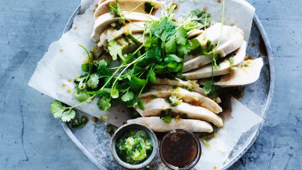 Steamed chicken with green spring onion oil.