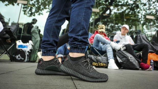 A queue on Elizabeth Street in the Sydney CBD for YEEZY sneakers designed by Kanye West.