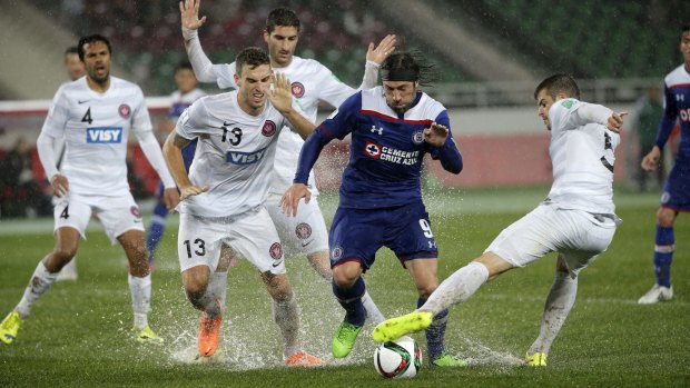 Dampener: Matthew Sprianovic and Brendan Hammill try to stop Hugo Pavone.