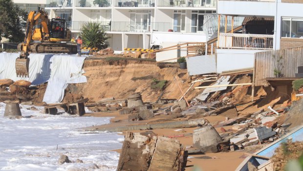 The clean-up continues at Collaroy beach following the weekend's storms.