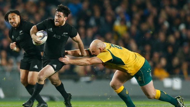 Nehe Milner-Skudder is tackled by Stephen Moore of the Wallabies duringin Auckland this year.