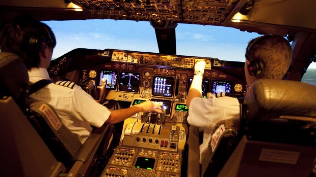 At the wheel: Pilots in a British Airways 747 simulator.