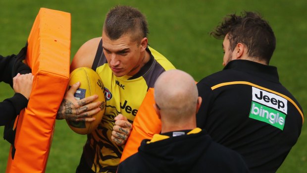 Dustin Martin will be able to visit his deported father in New Zealand.