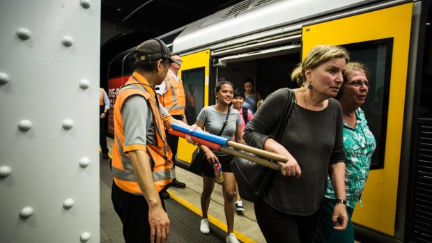 Relieved commuters emerge onto the platform at Wynyard Station.