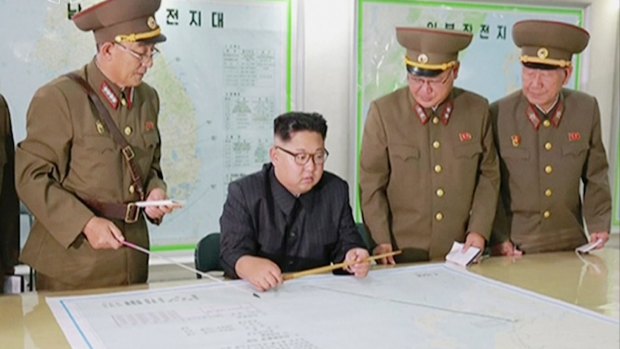 North Korean leader Kim Jong Un (centre) with senior military members.