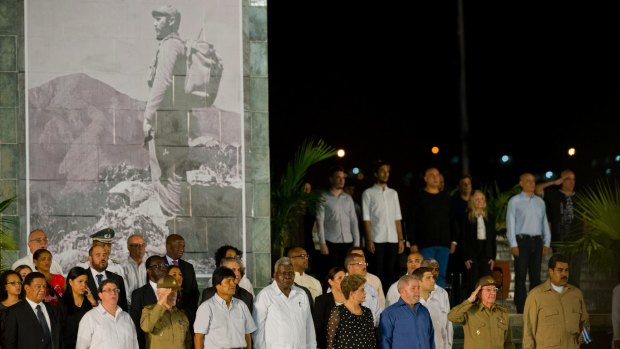 Cuban President Raul Castro, second from right, is flanked by Latin American leaders past and present during a rally honouring his brother Fidel Castro at Antonio Maceo plaza in Santiago de Cuba.