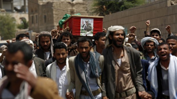 Shiite rebels, known as Houthis, carry the coffin of a fellow Houthi who was killed during fighting against  Saudi-backed Yemeni forces in Marib province.