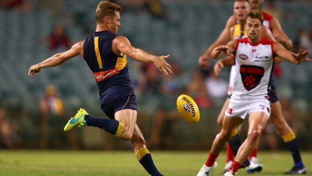 PERTH, AUSTRALIA - MARCH 09: Sam Mitchell of the Eagles kicks the ball into the forward line during the JLT Community Series AFL match between the West Coast Eagles and the Melbourne Demons at Domain Stadium on March 9, 2017 in Perth, Australia. (Photo by Paul Kane/Getty Images)