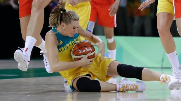 Australia guard Penny Taylor controls the loose ball during the second half of a women's basketball game against Belarus.