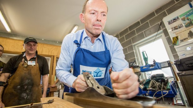 Tony Abbott gets dirty at the Mosman Men's Shed: a Father's Day boost.