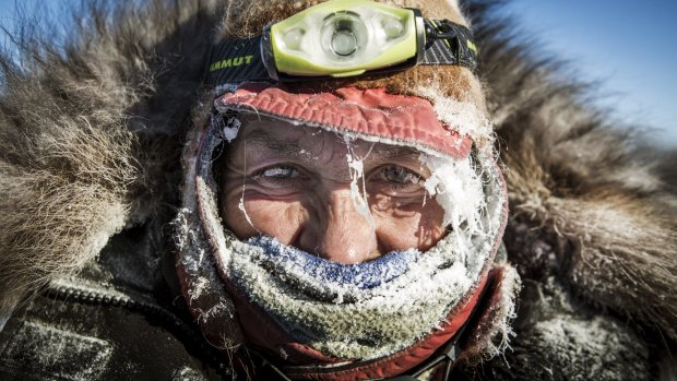 Iditarod competitor Marcelle Fressineau arrives at a checkpoint in Ruby, Alaska.