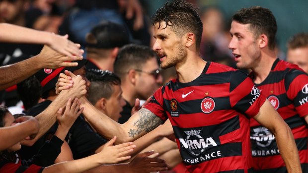 For the fans: Wanderers midfielder Dario Vidosic says it's time to give the club's fans a win over their cross-town rivals.