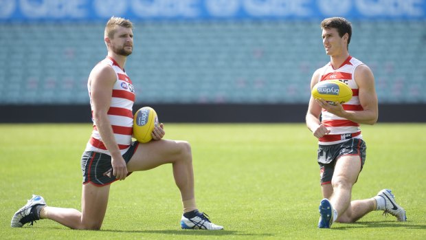 Swans Harry Marsh and Dean Towers train at the SCG, the ground where they would have preferred to have played their semi-final against North Melbourne.