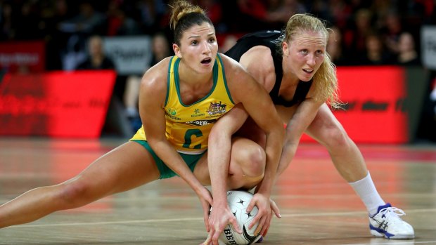 Mine. No, mine: New Zealand's Laura Langaman and Diamonds rival Kim Ravaillion battle for the ball.
