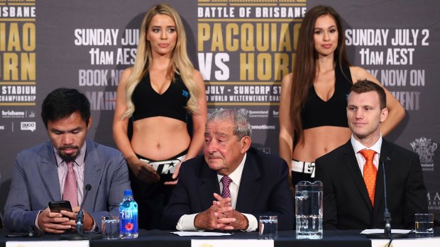 Distraction: Neither Manny Pacquiao nor Jeff Horn - seen here with Bob Arum - have been randomly tested by doping authorities ahead of Sunday's fight in Brisbane.