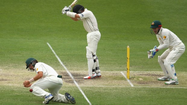 New kid: Joe Burns lets one slip at short leg during the Brisbane Test.