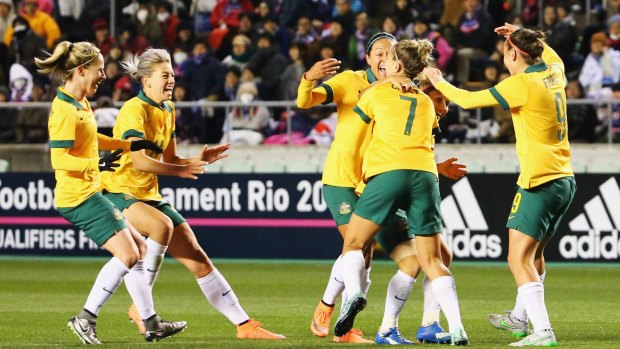 The Matildas celebrate during a Olympic qualifying match in February.
