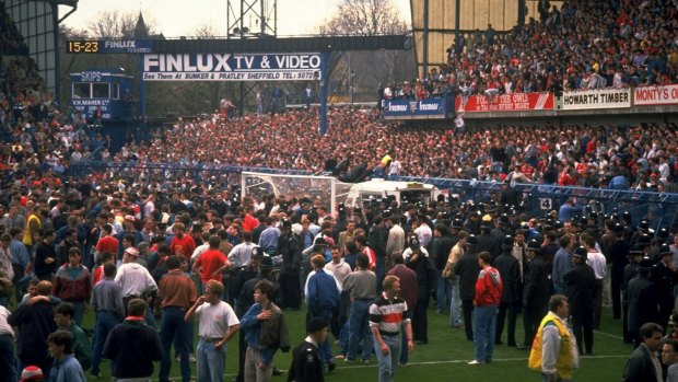Supporters are crushed against the barrier at the Hillsborough Stadium in Sheffield, England in 1989.