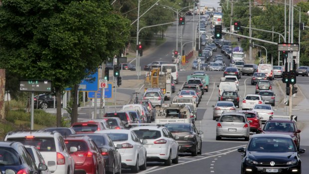 Traffic congestion at the level crossing on Toorak Road is one of the consequences of urban sprawl as buyers who cannot afford to live near the centre move to the city fringes. 