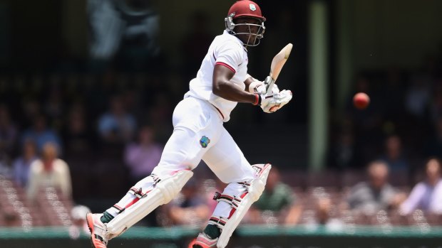 Tail wagging: No.11 Jomel Warrican bats for the West Indies during day five.