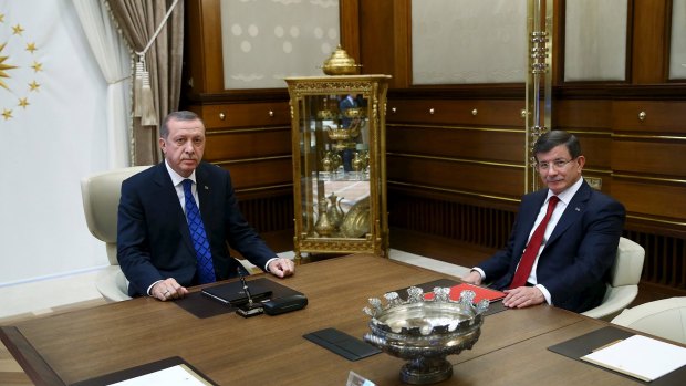 Turkey's President Tayyip Erdogan  with Prime Minister Ahmet Davutoglu in Ankara on Friday. 