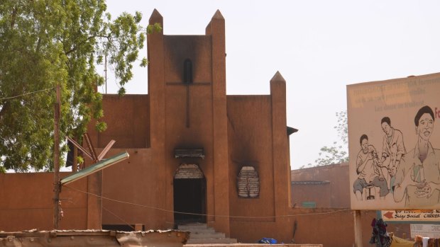 A church that was set on fire by protesters in Niamey, the capital of the West African state of Niger.