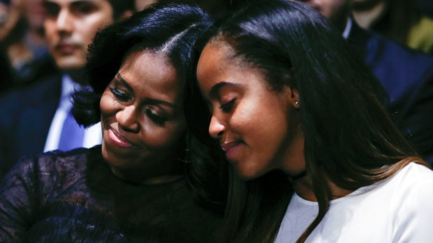 First lady Michelle Obama and daughter Malia on January 10. 