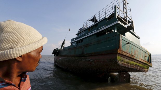 An abandoned boat which carried Rohingya and Bangladeshi migrants from Thailand is found off the coast near Indonesia's Aceh Province.