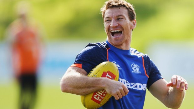Brent Harvey has a laugh at training on Wednesday despite being told he would not to be re-contracted.