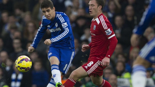 Chelsea's midfielder Oscar in action against West Brom.