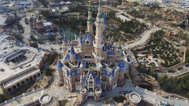 An aerial view of the Enchanted Storybook Castle under construction at the Shanghai Disney Resort in Shanghai. Staggs will miss the June opening of his biggest achievement.