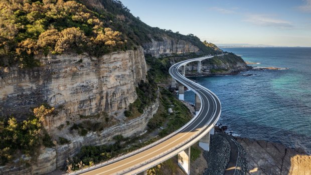 Resuming its southern fling, Lawrence Hargrave Drive twists through coastal villages north of Wollongong, skittering out over the ocean at Sea Cliff Bridge. The highway turns snake-like as it girdles the foothills of the coastal escarpment.