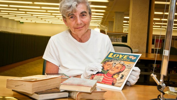 Queensland literature co-ordinator for the State Library, Joan Bruce, with some formerly banned books.