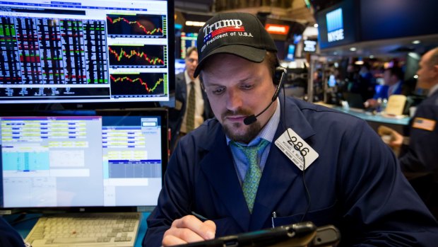 Bullish sentiment: A trader donned a Donald Trump hat while working on Friday on the floor of the New York Stock Exchange. 