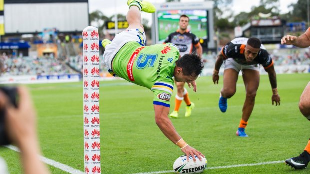 Acrobatic: Josh Rapana launches himself for the try line.