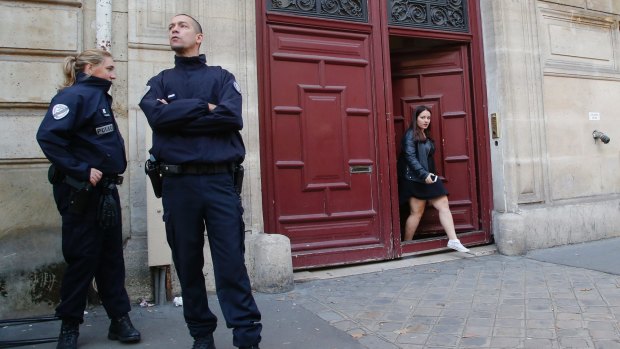 French police officers outside the residence of Kardashian West in Paris following the robbery.