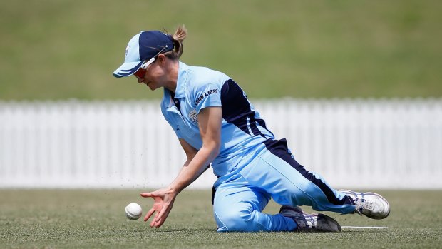 Staying power: Leah Poulton fields for NSW in her 100th match in the Women's National Cricket League.