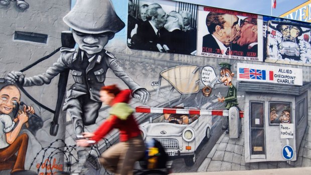 Nostalgia: Colourful murals painted on Berlin Wall at East Side Gallery.