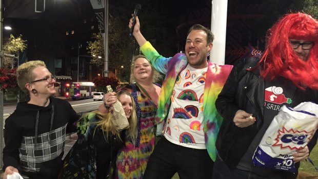 Revellers on Oxford Street celebrate Malcolm Turnbull's win in Liberal leadership spill.