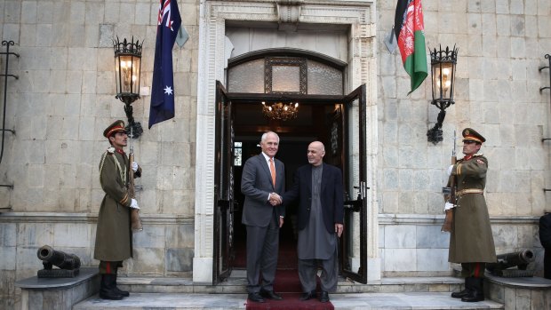 Malcolm Turnbull is greeted by the President of Afghanistan, Ashraf Ghani at the Presidential Palace