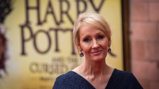 J.K. Rowling in front of the theatre in London where <i>Harry Potter and the Cursed Child</i> is playing.