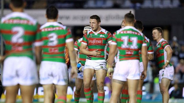 Injury to insult: Sam Burgess is helped from the field.