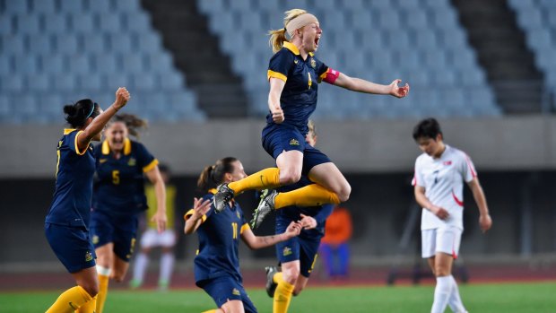 Overjoyed:  Captain Clare Polkinghorne celebrates Australia's qualification for the 2016 Rio Olympics.