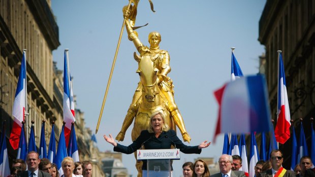 France's far-right National Front President Marine Le Pen delivers a speech during the party's annual celebration of Joan of Arc in Paris.