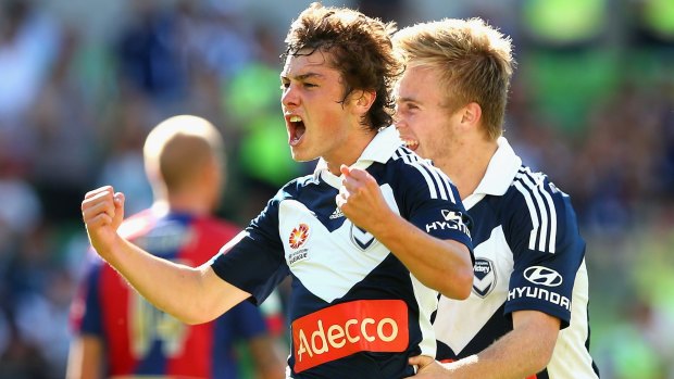 Marco Rojas celebrates after scoring during the 2013 A-League season.
