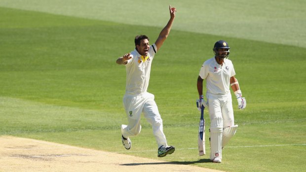 Appealing: Mitchell Johnson appeals unsuccessfully for the wicket of Shikhar Dhawan early on the third day.